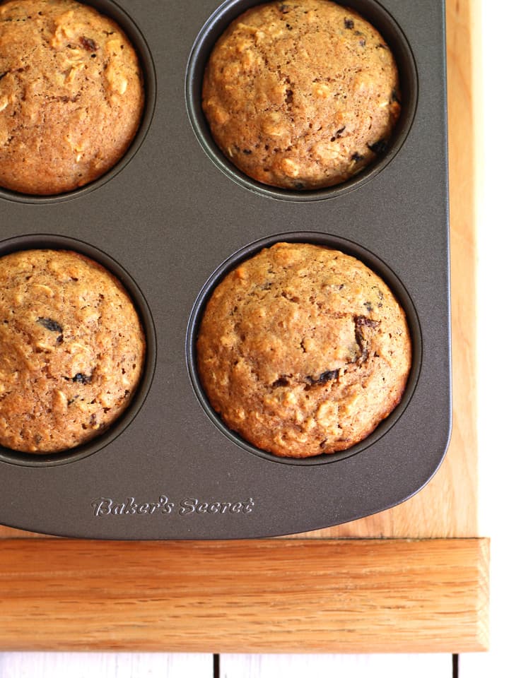 Toaster Oven Oatmeal Raisin Muffins Baked muffins in a muffin pan.