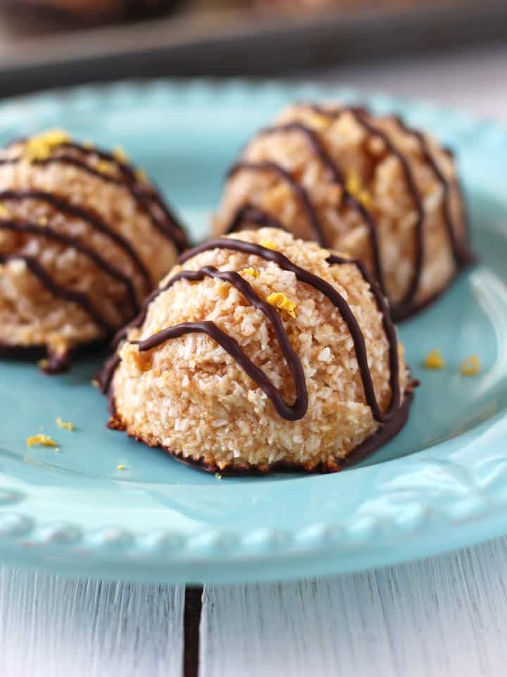 Closeup of chocolate drizzle on a coconut macaroon.