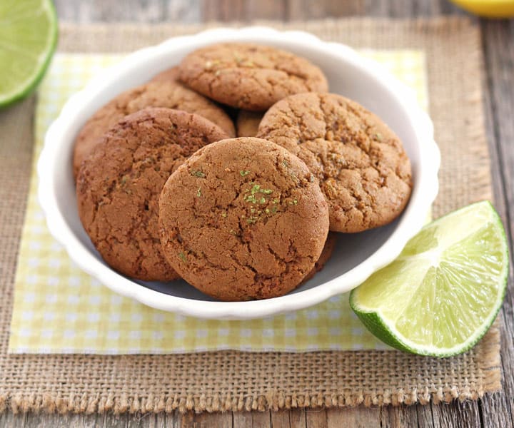 Close up of coconut sugar cookies in a small white bowl.