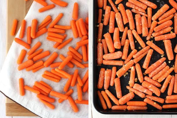 Baby carrots drying on a towel and in a roasting pan with oil.