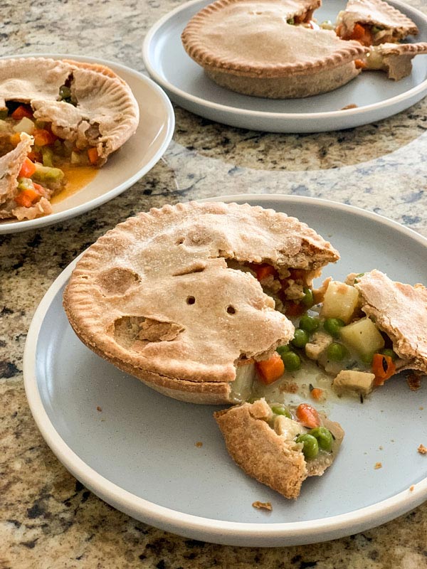 3 plates with cooked pot pies