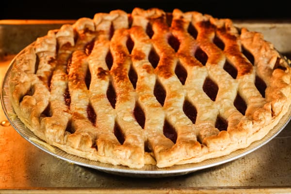 Baking pie with uneven browning on crust.