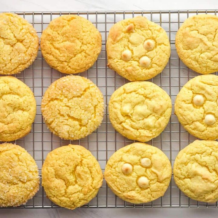 Baked lemon cake mix cookies cooking on a wire rack.