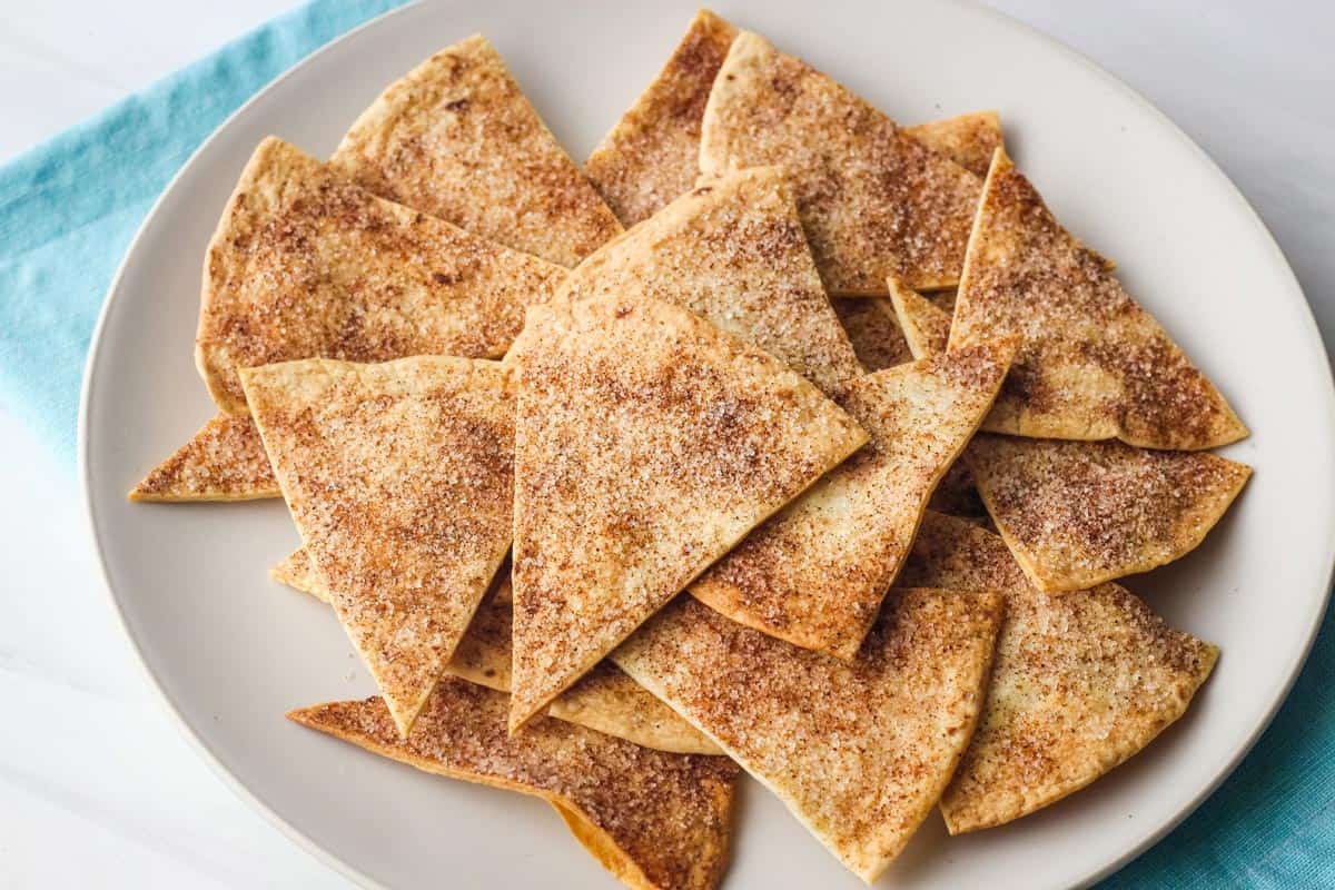 Baked cinnamon chips on a plate.