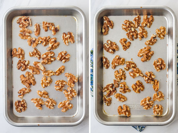 Raw and toasted walnuts on a baking sheet.