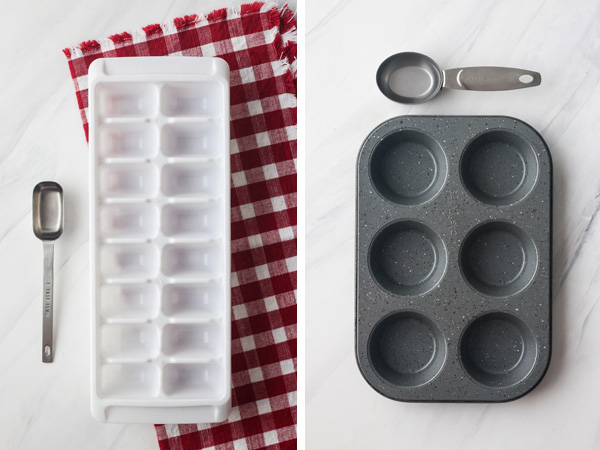 Ice cube tray with a tablespoon and muffin tin with a quarter cup.