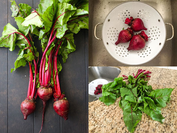 Beets with greens removed and rinsed in a white colander.