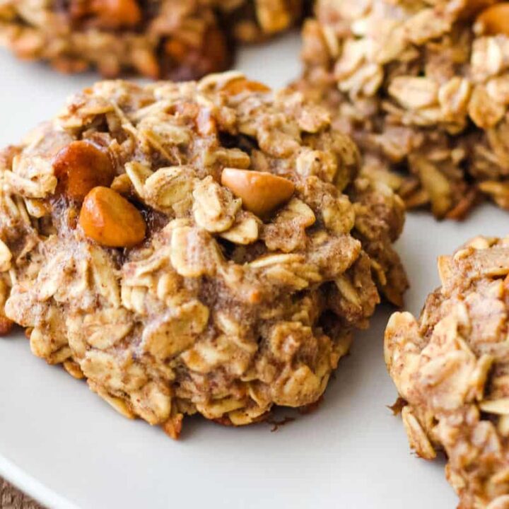 Closeup of cookie with baking chips and oats.