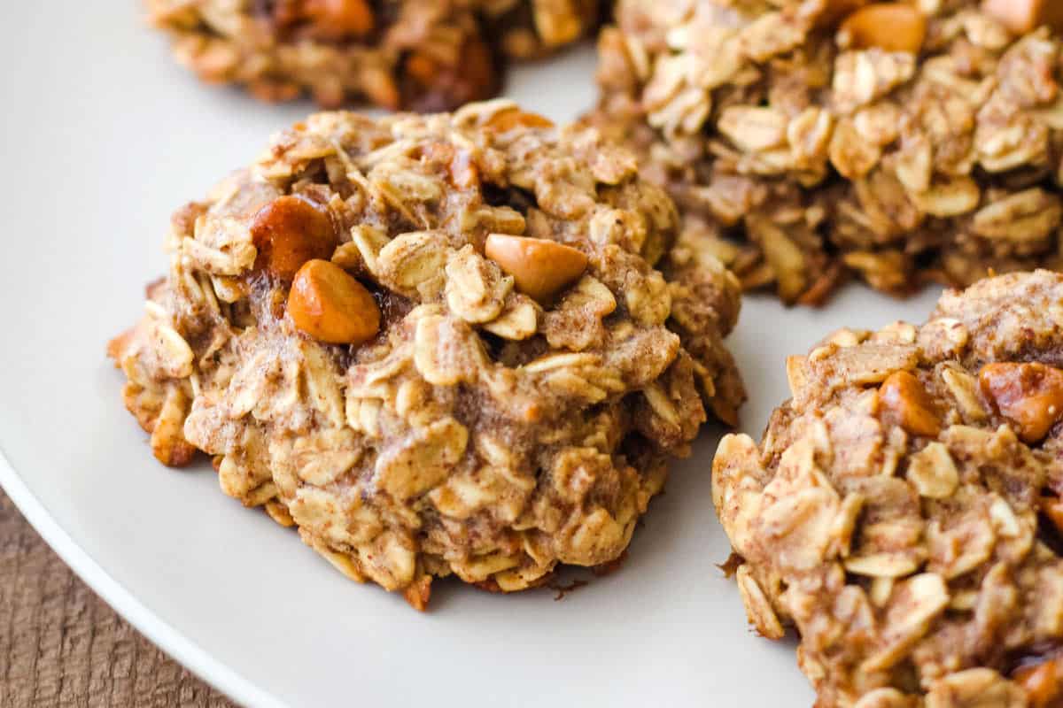 Closeup of cookie with baking chips and oats.