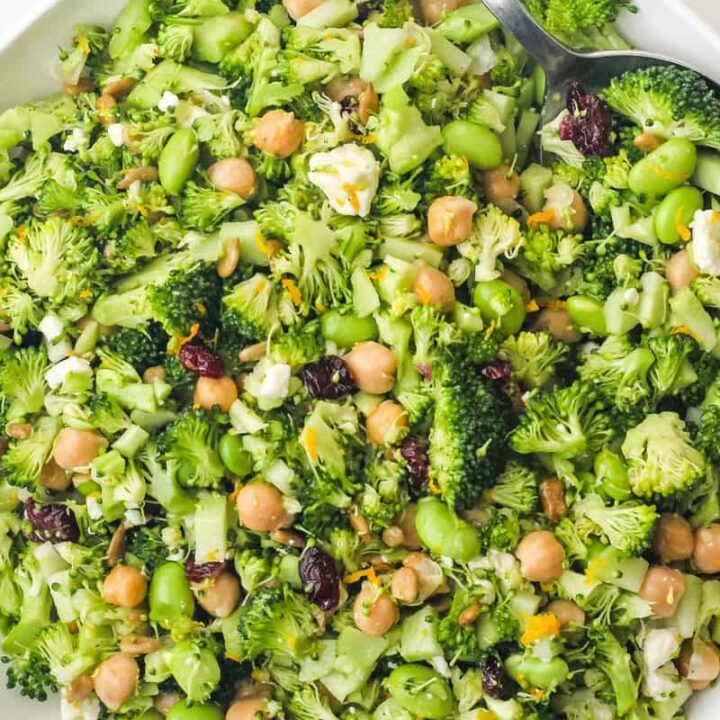 Overhead view of chopped broccoli salad in a large bowl.