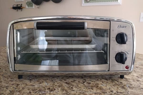 Small toaster oven on a kitchen counter.
