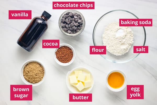 Ingredients in bowls and ramekins arranged on table and labeled.