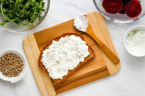 Cottage cheese spread on toasted bread.