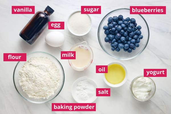 Overhead view of ingredients arranged on table with labels.