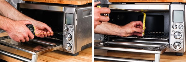 Man measuring inside toaster oven with yellow tape measure.