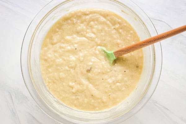 Closeup of lumpy mixed banana bread batter.