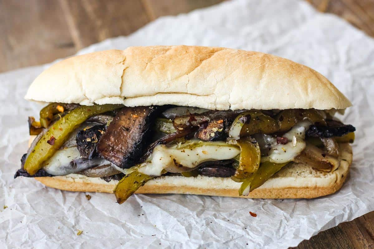 Sub roll stuffed with marinated mushroom slices, green pepper, and onions all topped with melty cheese.