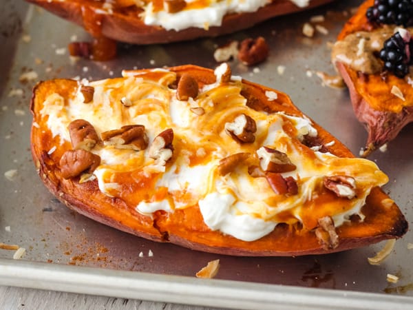 Baked sweet potato half topped with Greek yogurt, pumpkin butter and chopped pecans.