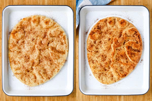Overhead view of flatbread on pan sprinkled with cinnamon and golden baked flatbread.