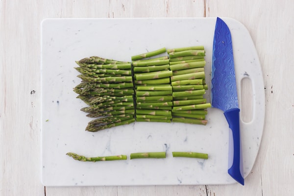 A bunch of fresh asparagus chopped into thirds