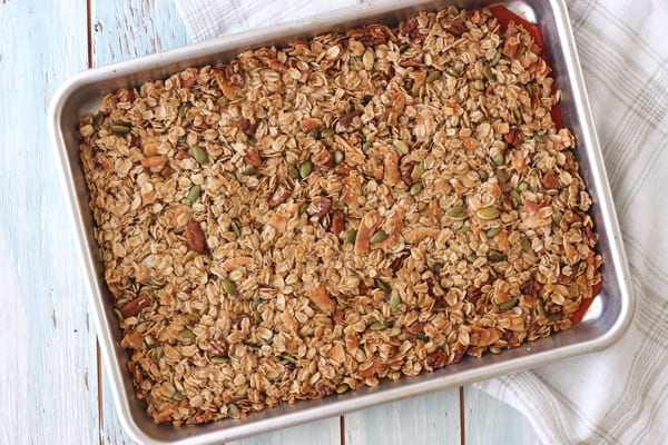 Baked granola in a quarter sheet pan